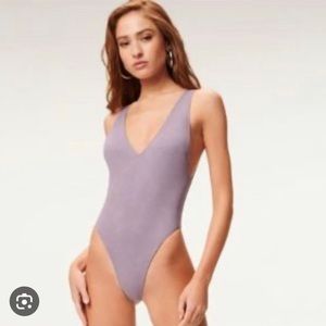 Good American New lilac coloured suede finish one piece bathing suit